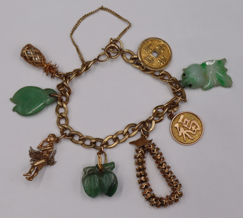 JEWELRY. 14KT GOLD CHARM BRACELET