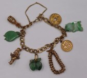 JEWELRY. 14KT GOLD CHARM BRACE