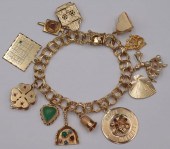 JEWELRY. 14KT GOLD CHARM BRACE