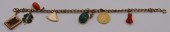 JEWELRY. 14KT GOLD CHARM BRACE