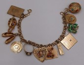 JEWELRY. 14KT GOLD CHARM BRACE