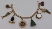 JEWELRY. 14KT GOLD CHARM BRACE