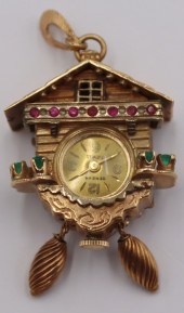 JEWELRY. 14KT GOLD CUCKOO CLOC