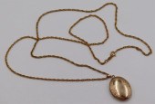 JEWELRY. 14KT GOLD LOCKET AND