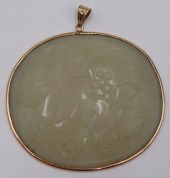 JEWELRY. 14KT GOLD MOUNTED JAD