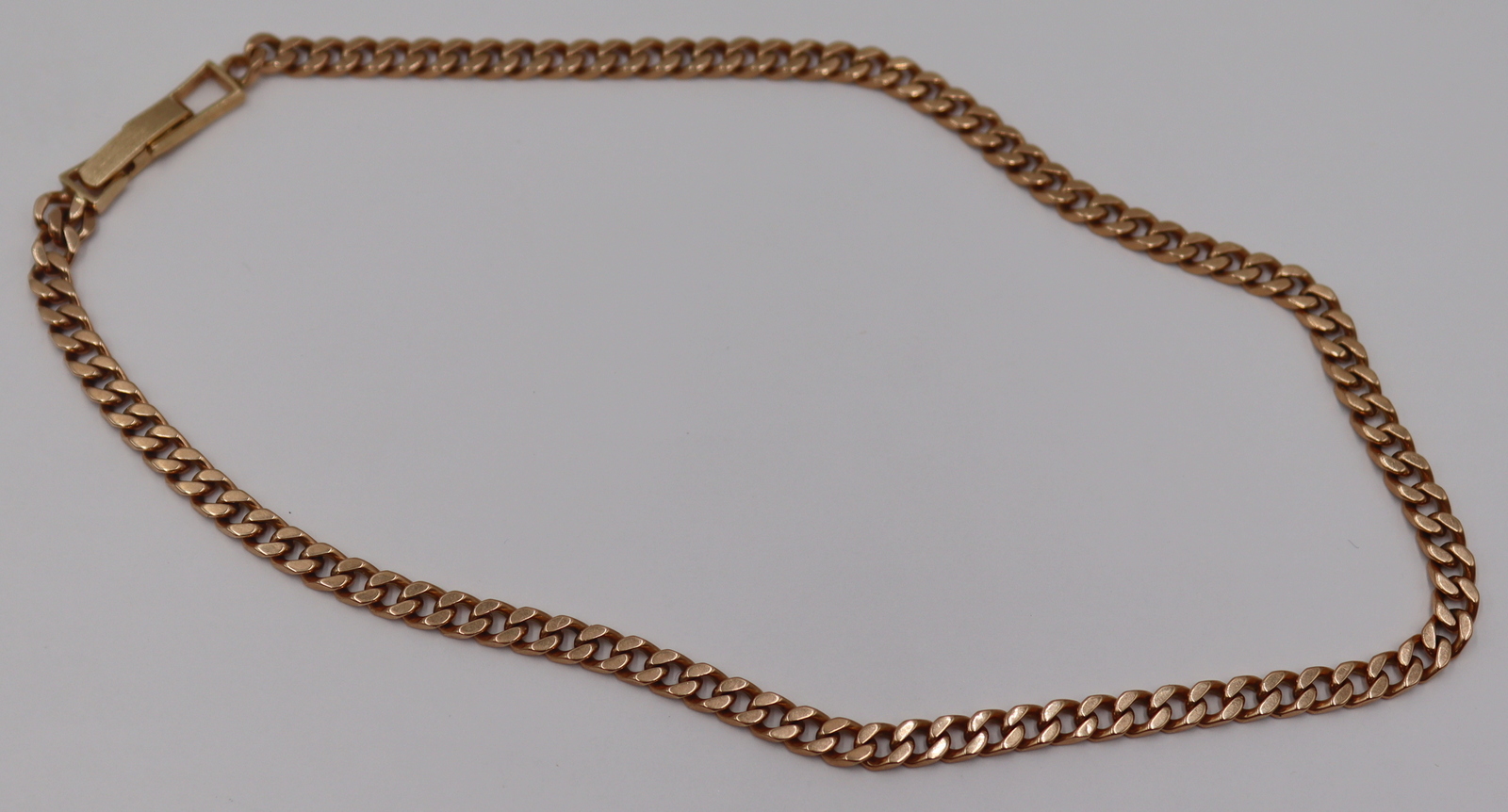 JEWELRY. 14KT ROSE GOLD CUBAN