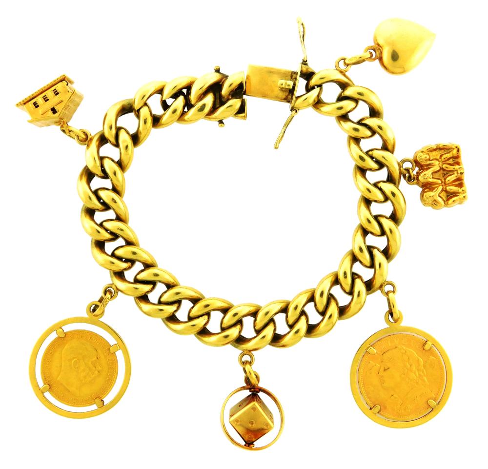 JEWELRY: 18K CHARM BRACELET WITH