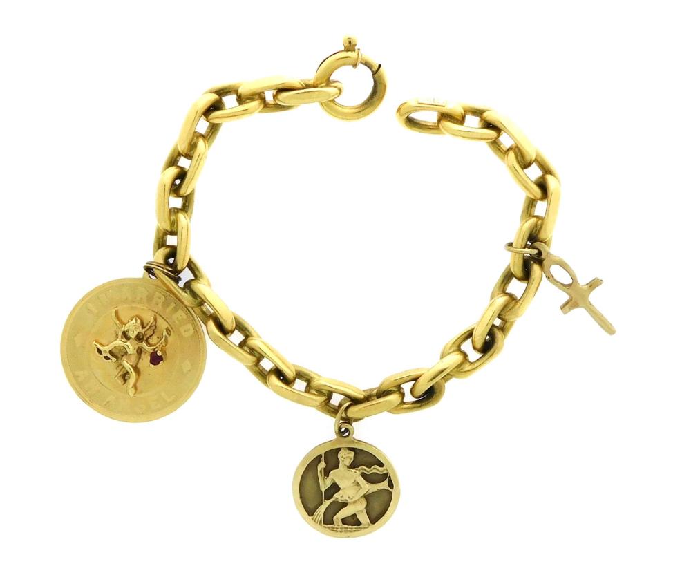 JEWELRY: 18K CHARM BRACELET WITH