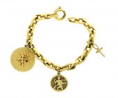 JEWELRY: 18K CHARM BRACELET WI