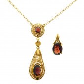 JEWELRY: 18K GARNET NECKLACE A
