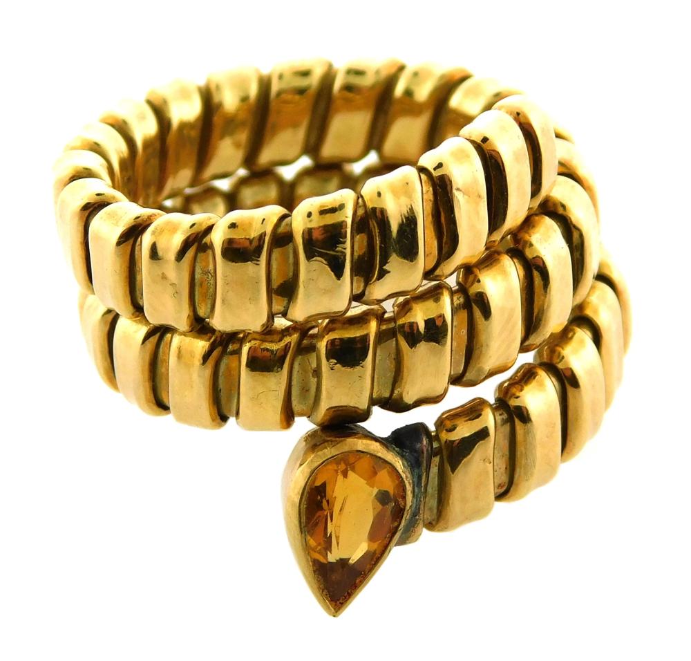 JEWELRY: 18K GOLDEN SAPPHIRE COIL