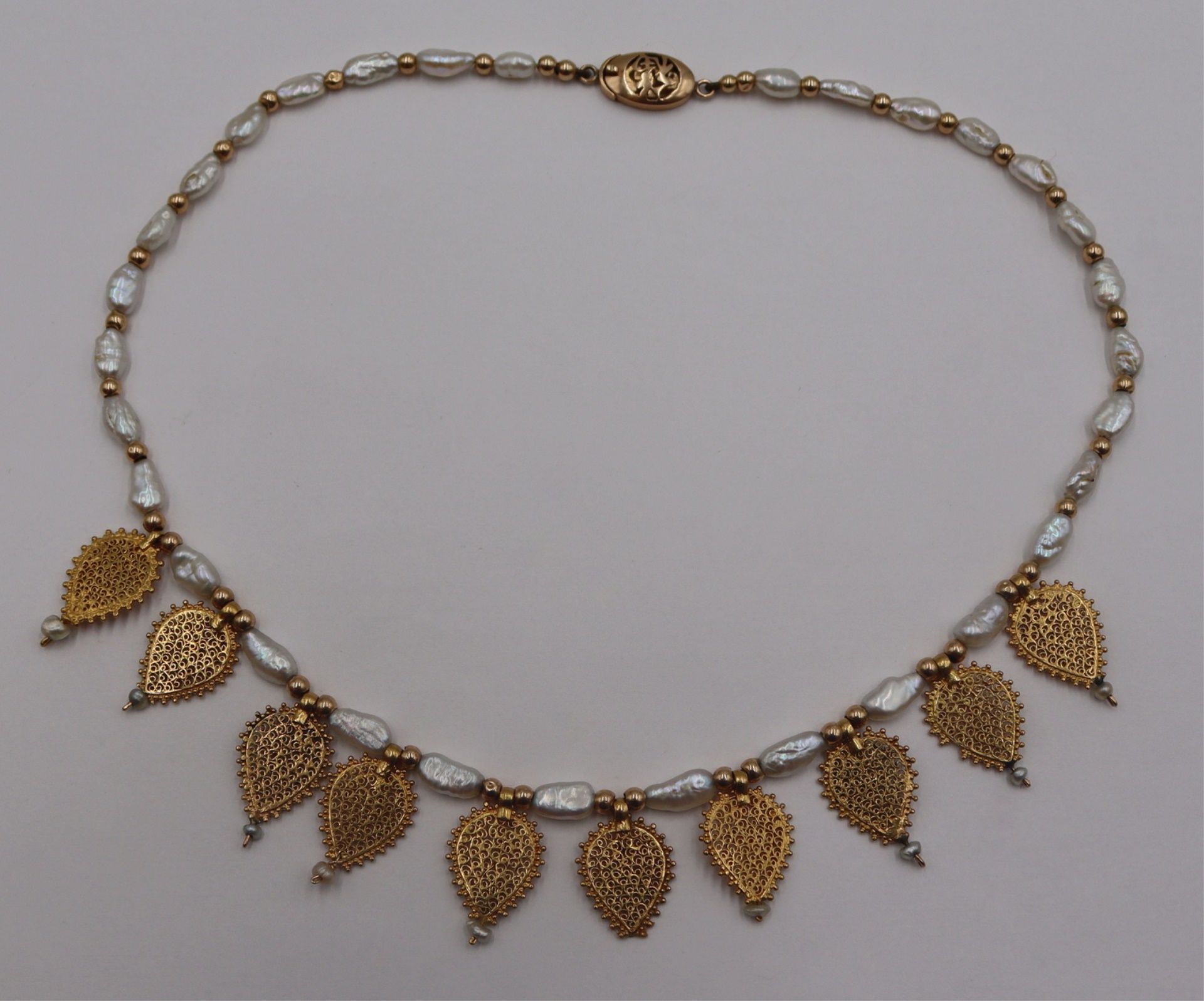 JEWELRY. 18KT GOLD AND KESHI