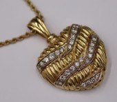 JEWELRY. 18KT GOLD AND RBC DIA