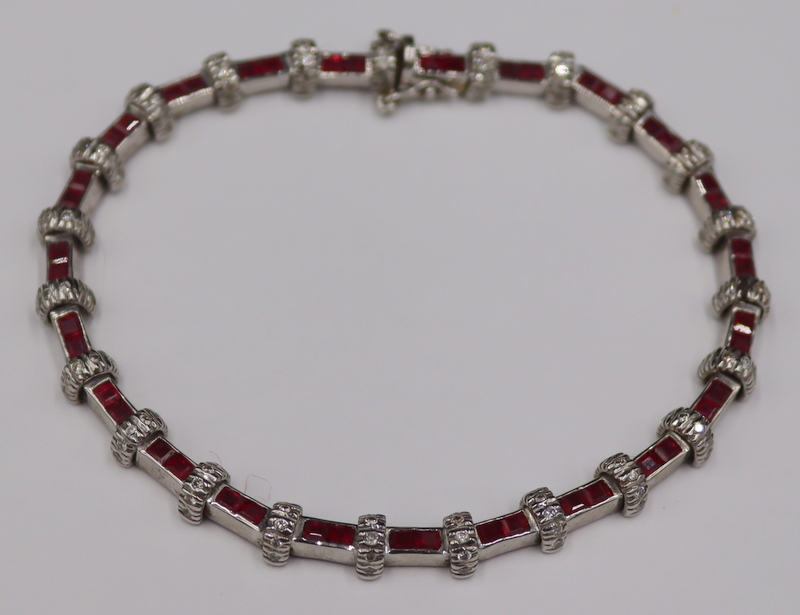 JEWELRY. 18KT GOLD, RUBY AND