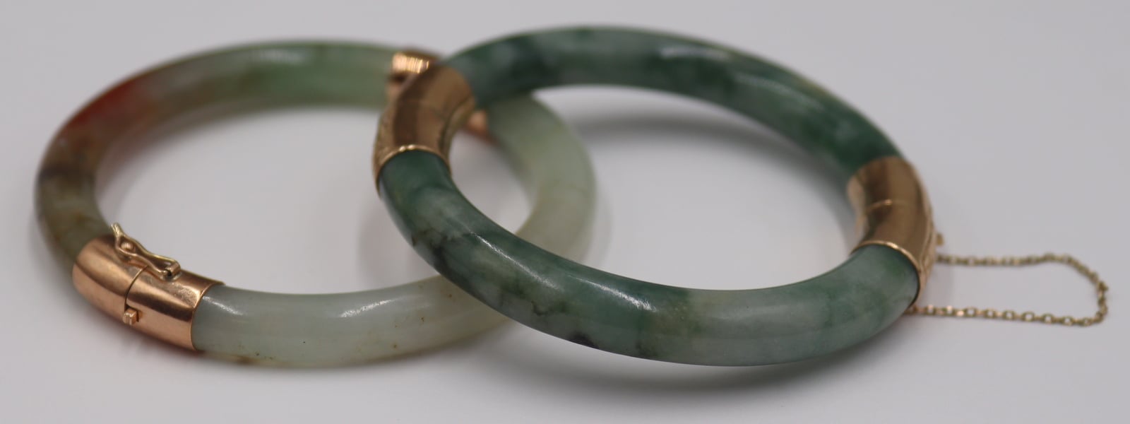 JEWELRY. (2) 14KT GOLD MOUNTED JADE