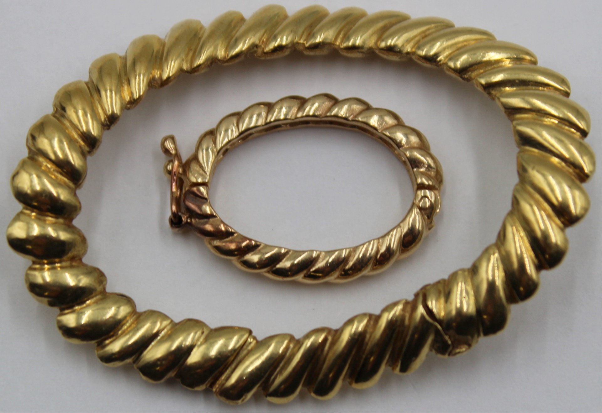 JEWELRY. (2) GOLD HINGED PENDANT,