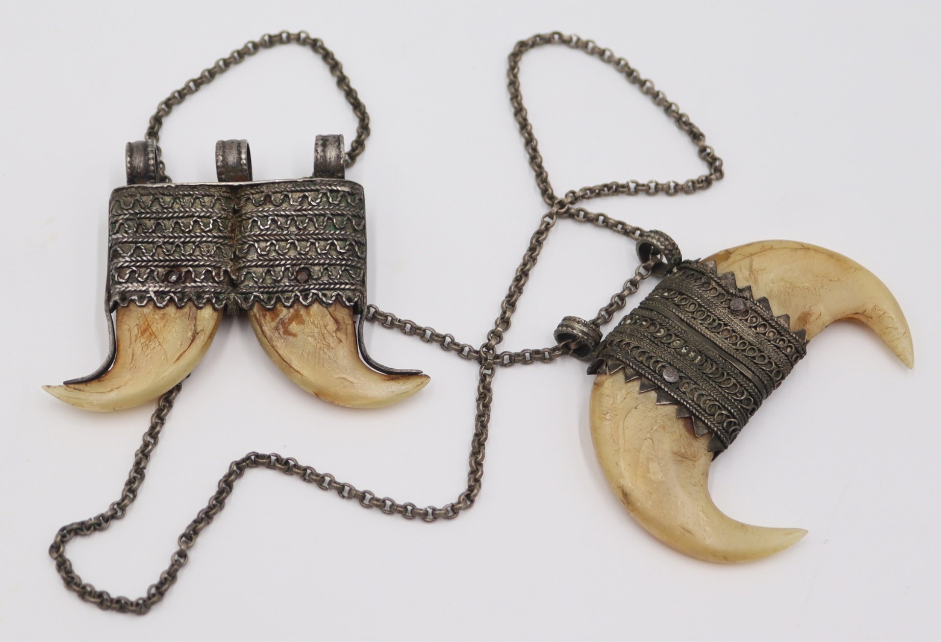 JEWELRY. (2) INDIAN TIGER CLAW