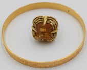 JEWELRY. 21KT GOLD BANGLE AND