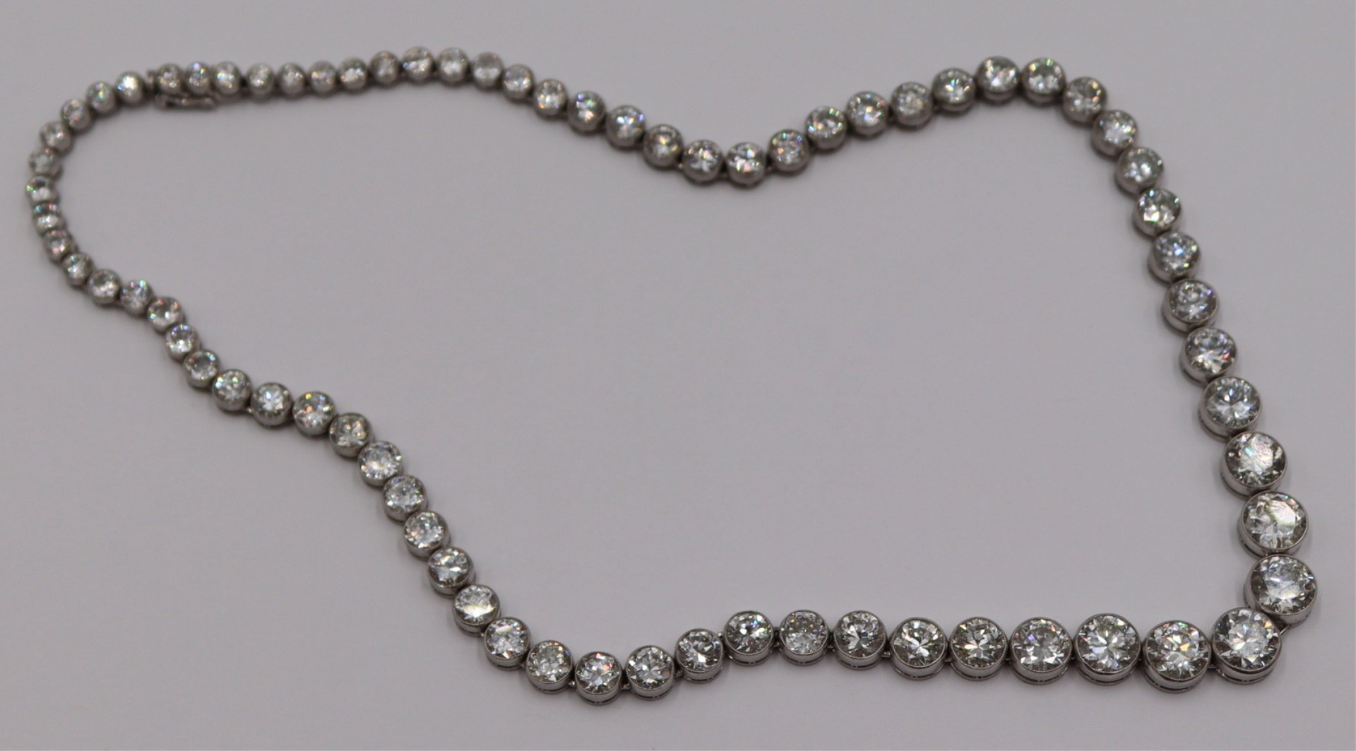 JEWELRY. 33CT DIAMOND AND 18KT GOLD