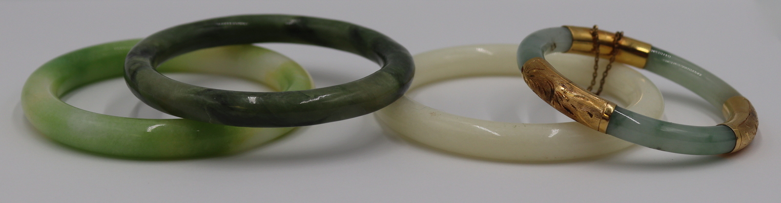 JEWELRY. (4) POSSIBLY JADE BANGLE