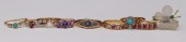 JEWELRY. (9) ASSORTED GOLD GEM
