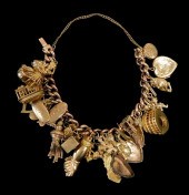 JEWELRY: 9K CHARM BRACELET WIT