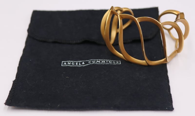 JEWELRY. ANGELA CUMMINGS 18KT
