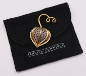 JEWELRY. ANGELA CUMMINGS 18KT