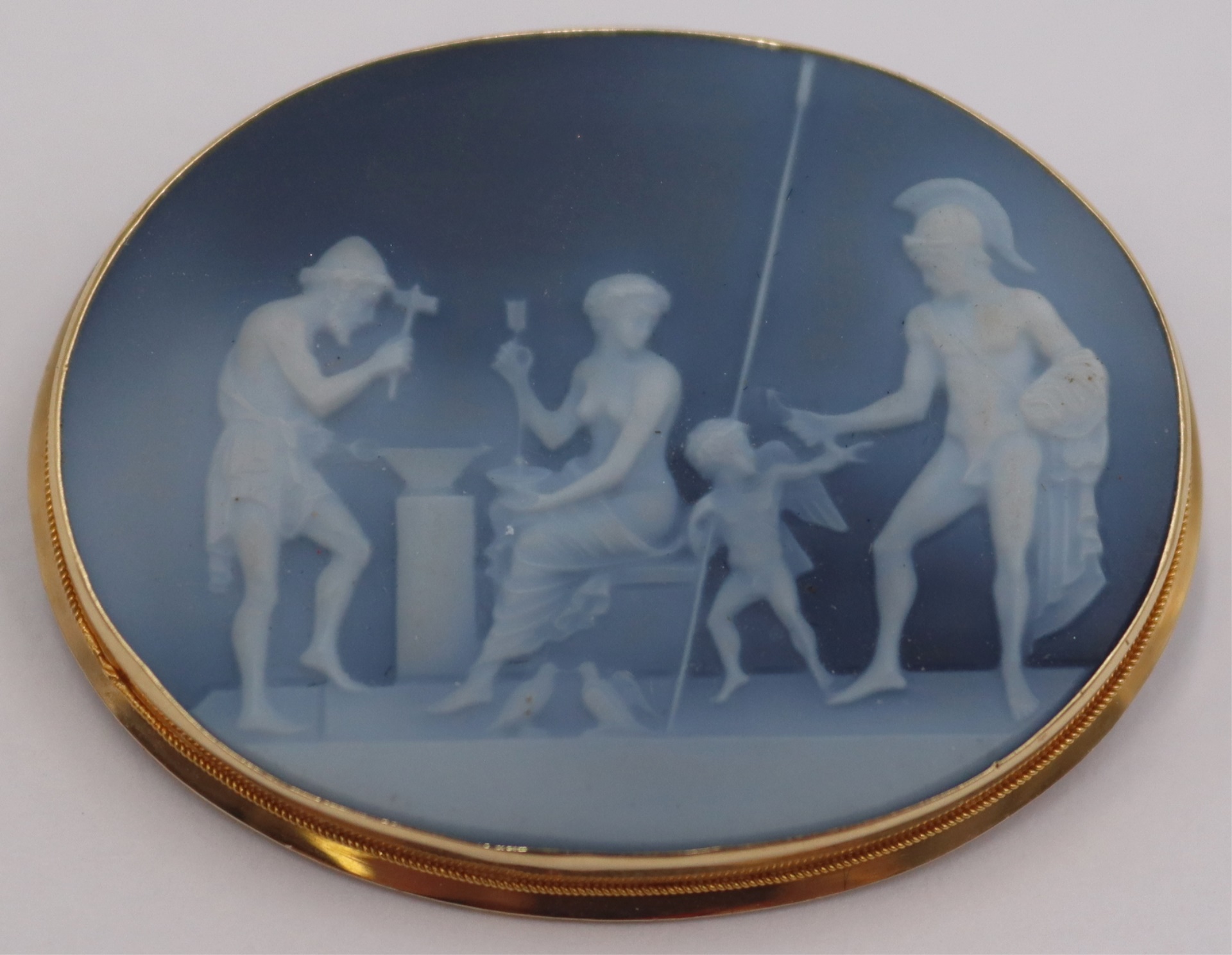 JEWELRY. ANTIQUE CARVED 'VULCAN'S