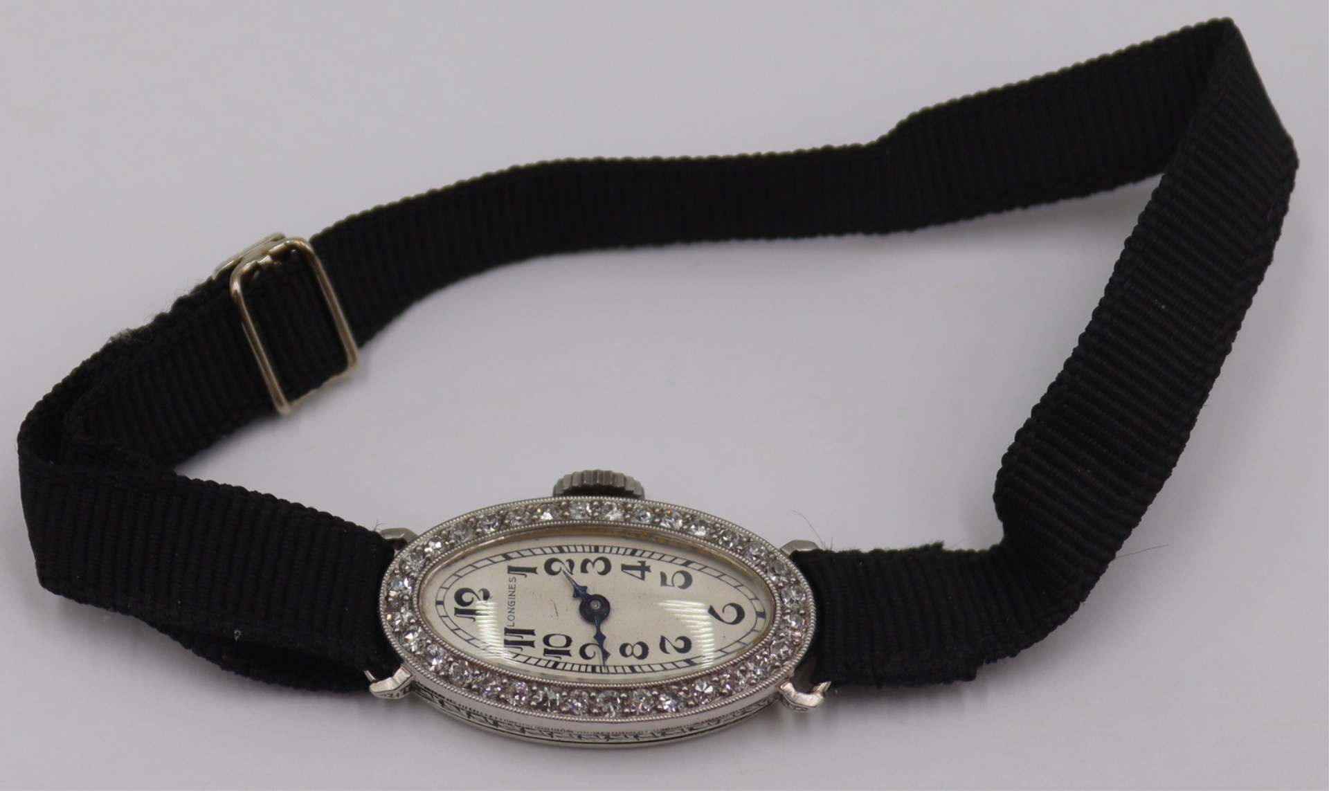 JEWELRY. ANTIQUE LONGINES