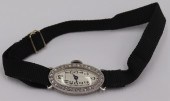 JEWELRY. ANTIQUE LONGINES PLAT