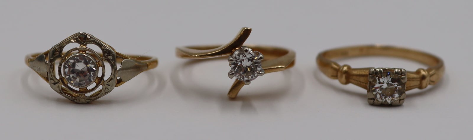 JEWELRY. ASSORTED DIAMOND RINGS.
