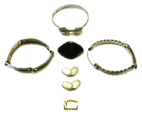 Jewelry: black diamond-shaped pin