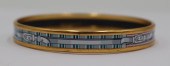 JEWELRY. HERMES ENAMEL BANGLE