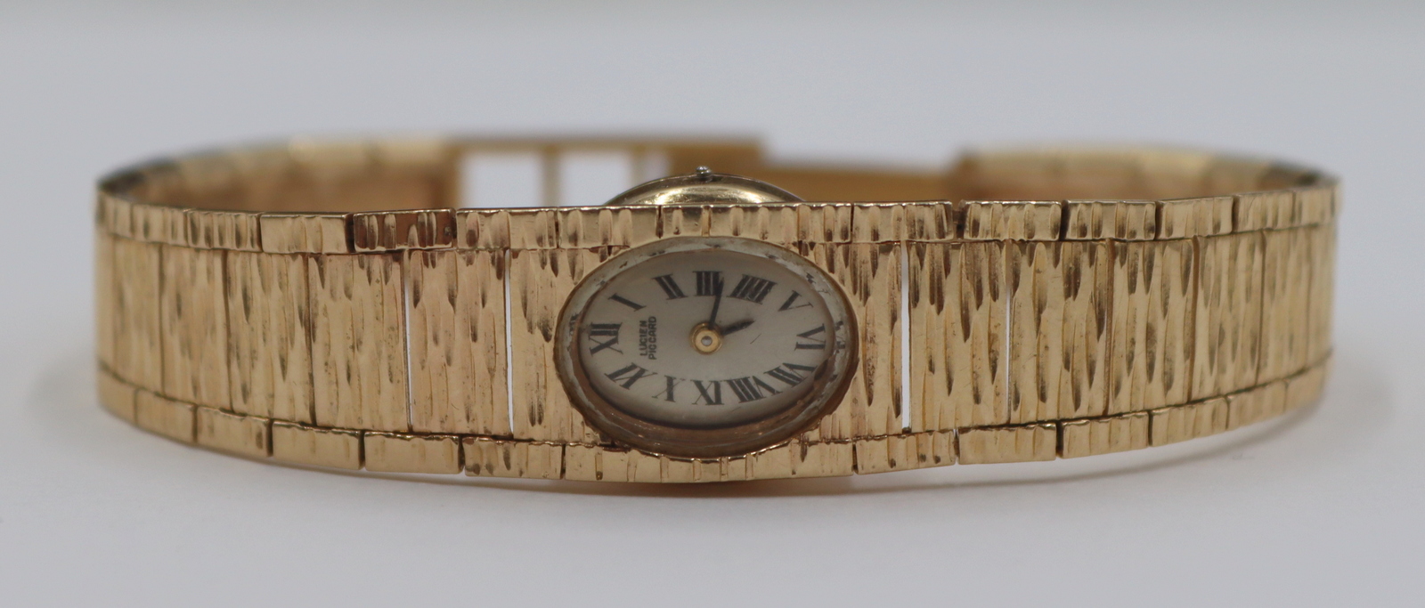 JEWELRY. LADY'S LUCIEN PICCARD 14KT