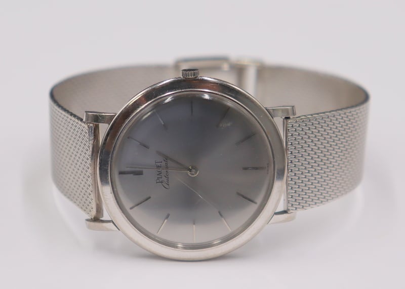 JEWELRY. MEN'S PIAGET ALTIPLANO