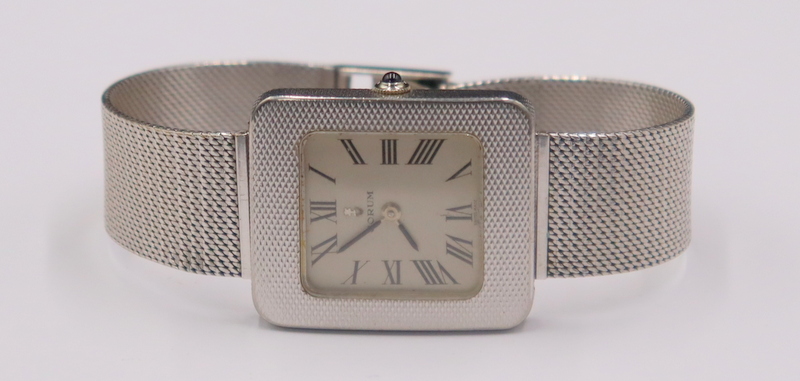 JEWELRY. MEN'S VINTAGE CORUM 18KT