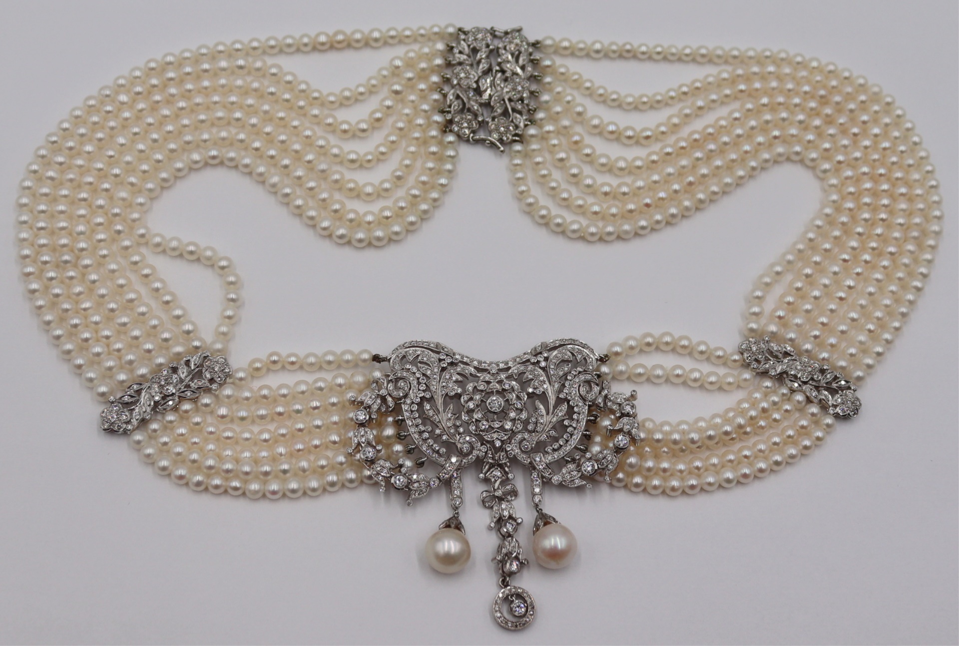 JEWELRY. MULTI-STRAND 18KT PEARL