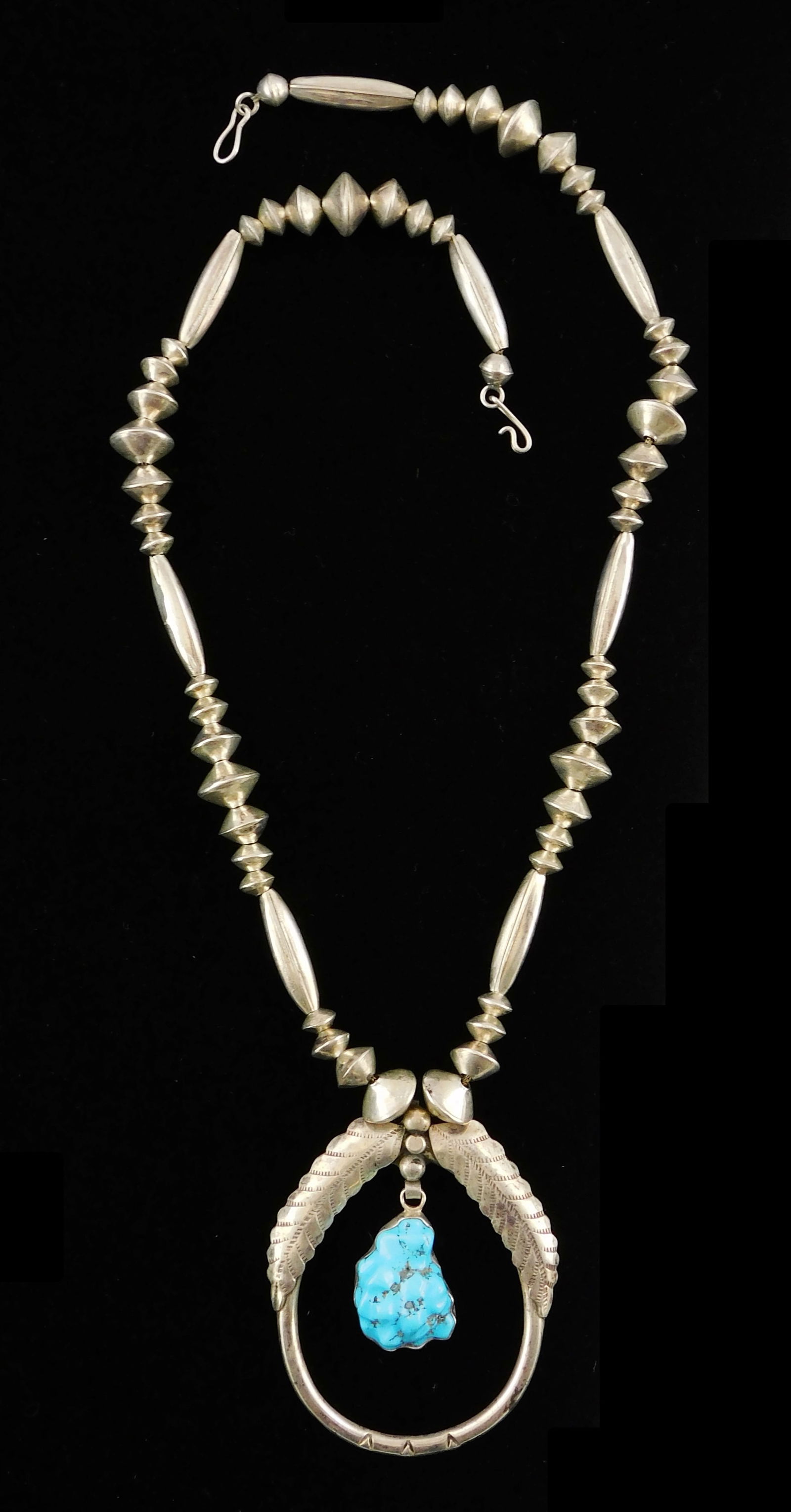 JEWELRY: NAVAHO STYLE SILVER AND