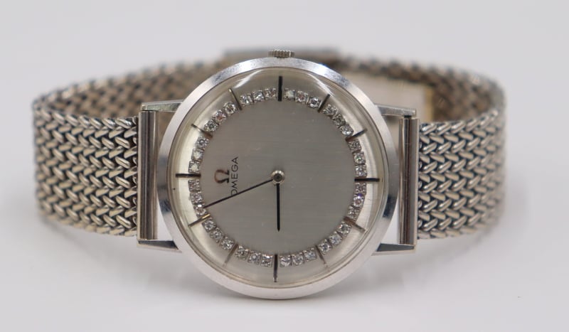 JEWELRY. OMEGA 14KT WHITE GOLD