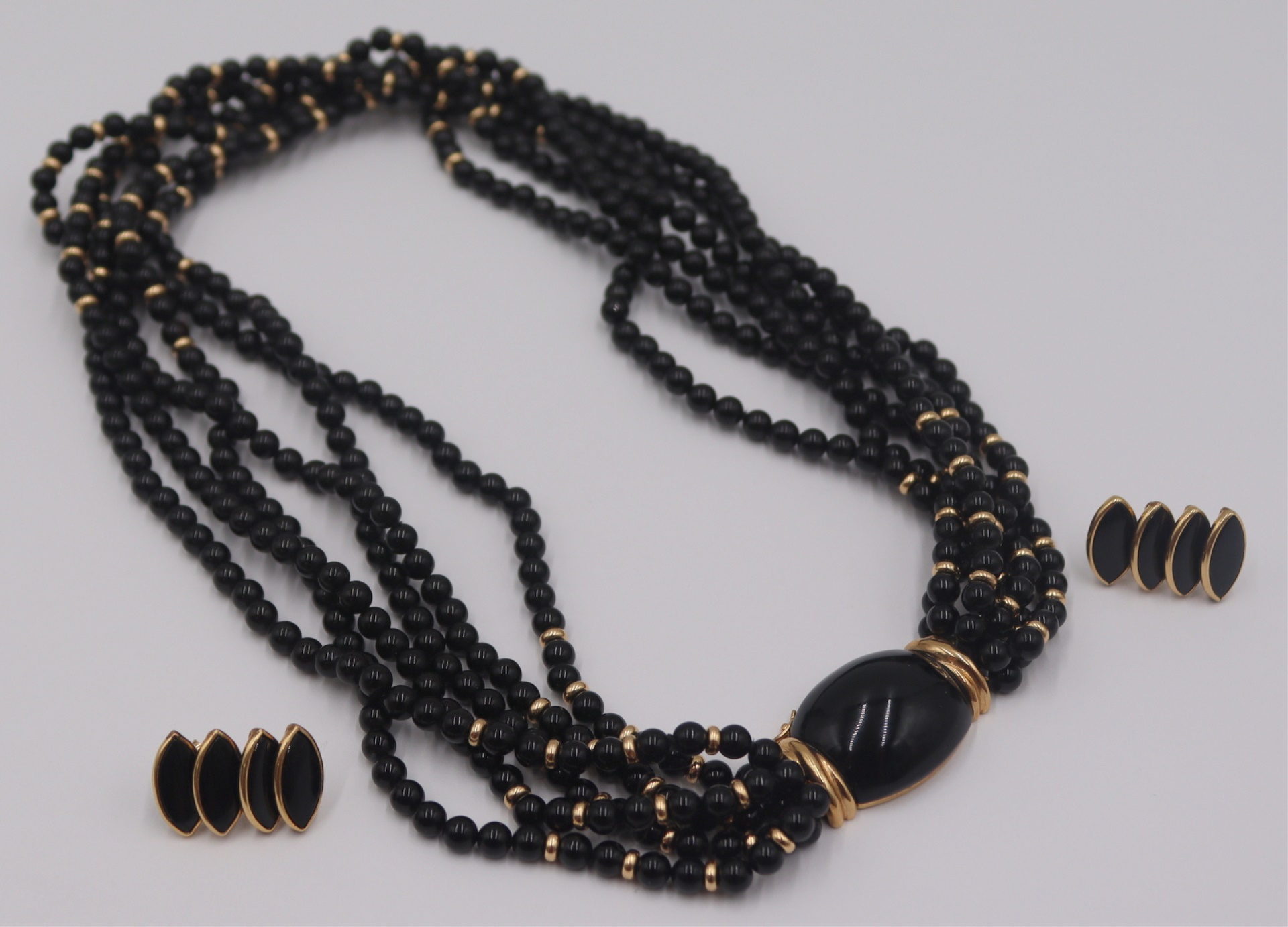 JEWELRY. ONYX AND 14KT GOLD JEWELRY