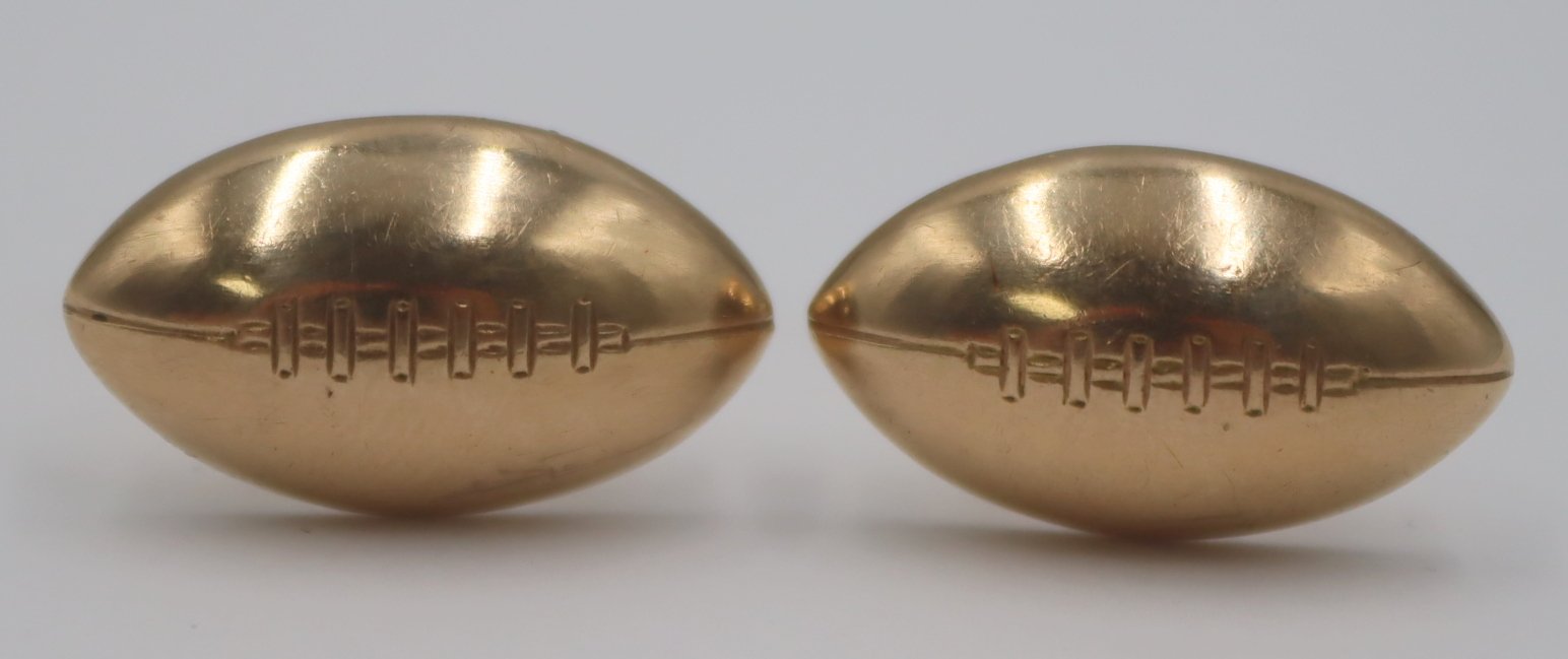 JEWELRY. PAIR OF 14KT GOLD FOOTBALL