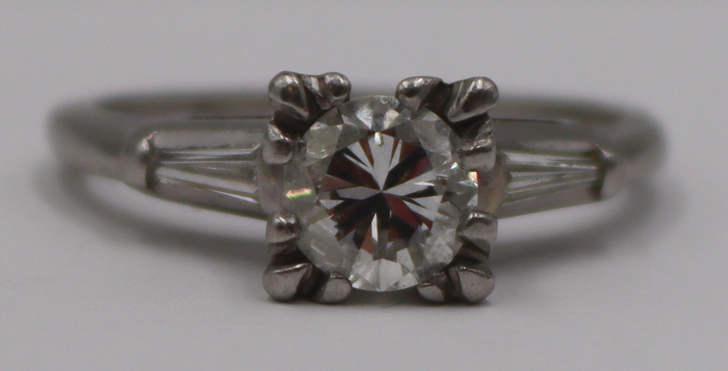 JEWELRY. PLATINUM AND 0.50CT RBC