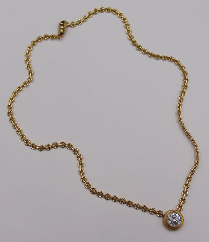 JEWELRY. SAM LEHR 18KT GOLD AND 1CT