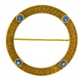 JEWELRY: SAPPHIRE CIRCLE BROOC