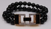 JEWELRY. SIGNED M+J SAVITT 14K