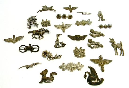 JEWELRY: Silver pins  twenty five