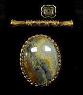 JEWELRY: THREE 14K GOLD PINS,