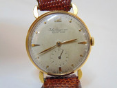 JEWELRY. VINTAGE 18KT WRIST WA