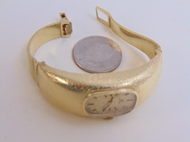 JEWELRY. VINTAGE GOLD WRISTWATCH,